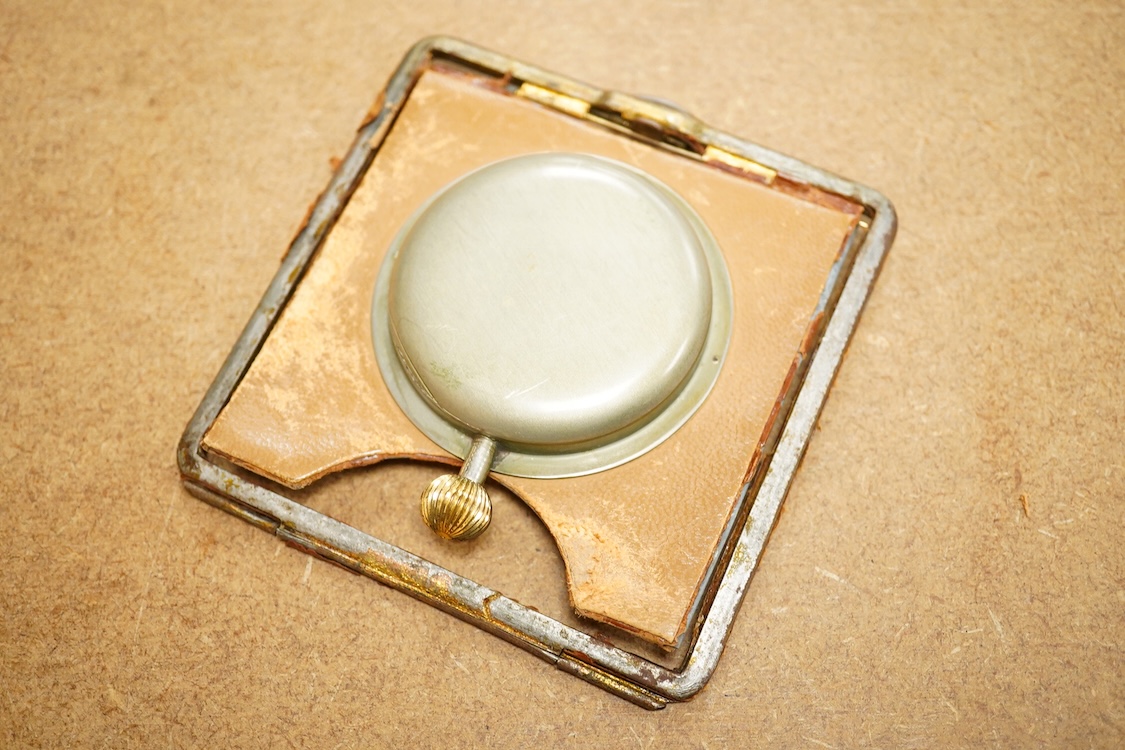 An Asprey crocodile inset travelling 8 day timepiece 10 cm high.